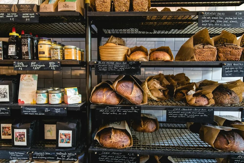 Bakery products displayed on working retail shelves